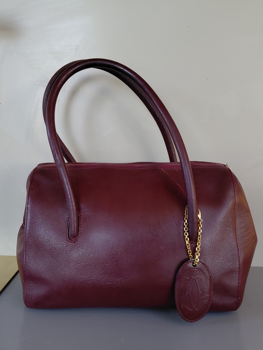 Cartier Deep Burgundy Leather Satchel with Gold Chain Detail